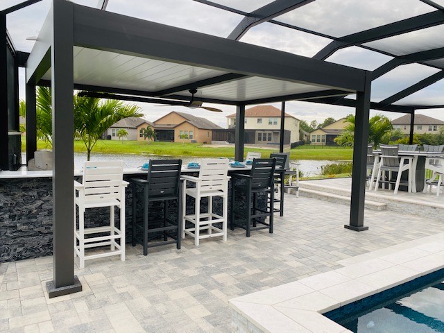 Covered outdoor kitchen with Azemco pergola in Orlando, FL