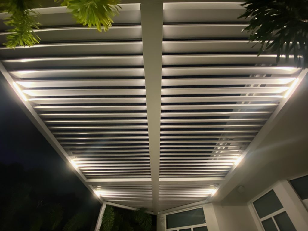 Louvered roof pergola with pointed ends