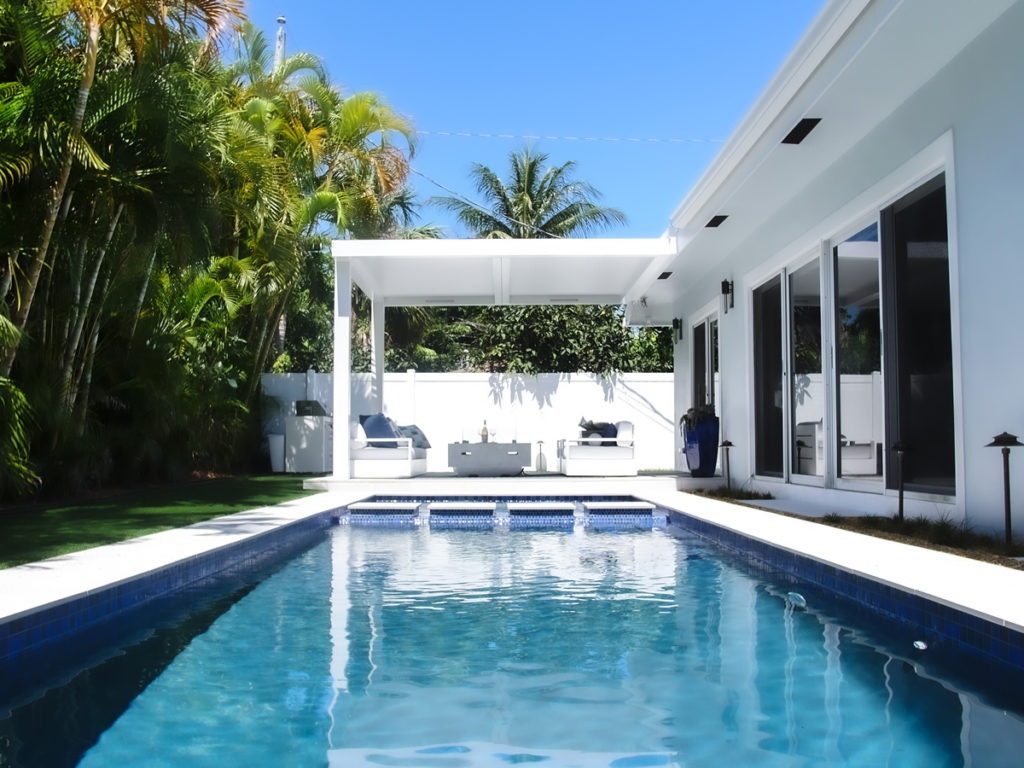 fixed pergola attached to the house for pool deck by Azenco