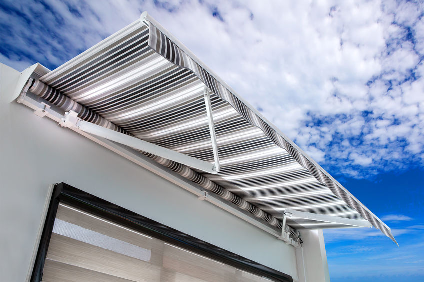 Patio covers: Canvas awning attached to the house