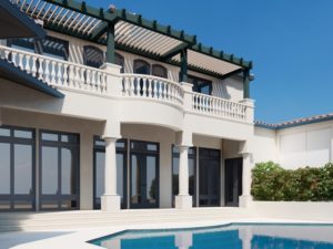 louvered roof balcony with pool view