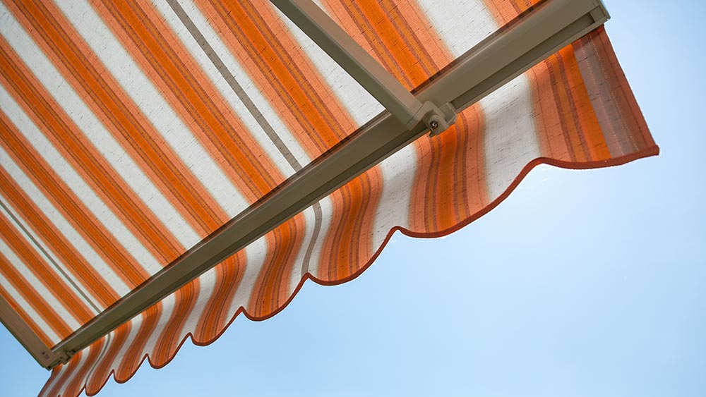 Fabric retractable awning