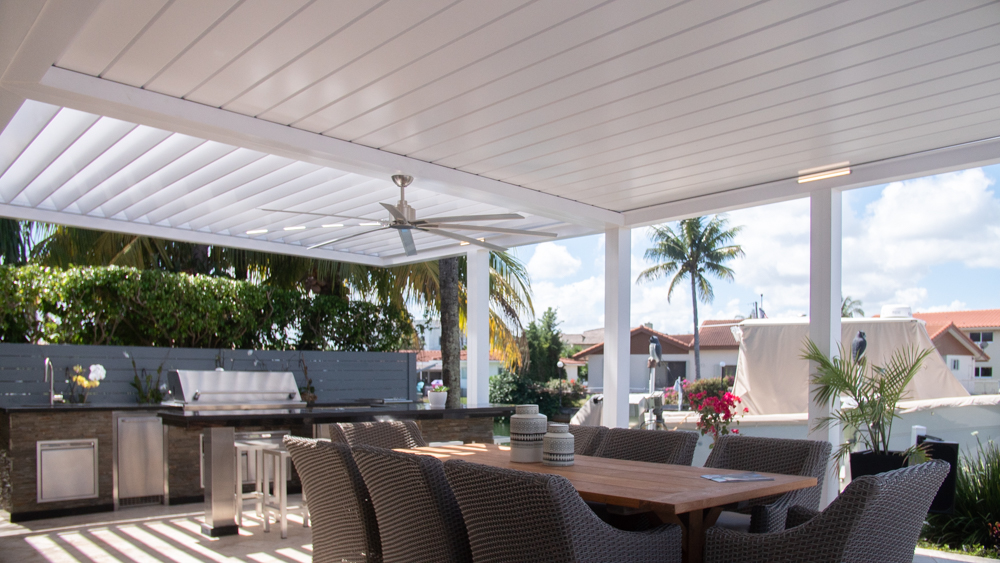 covered outdoor kitchen attached to house