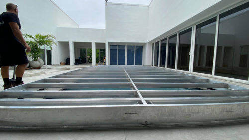 pool cover sliding structure installation by Azenco