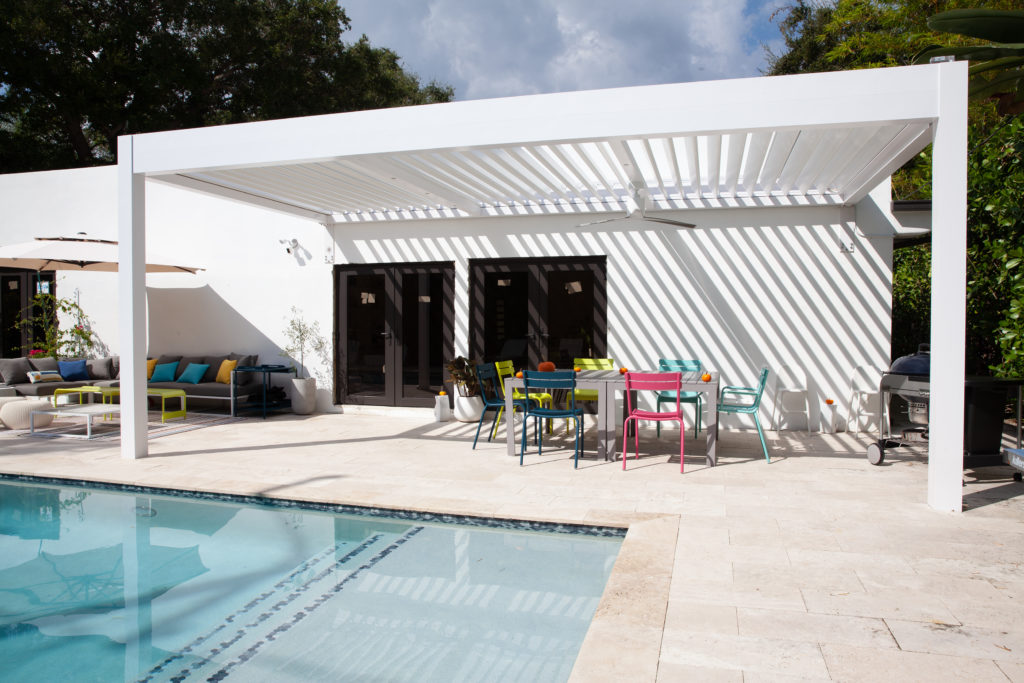 R-Blade louvered pergola in White by Azenco. Model attached to the house
