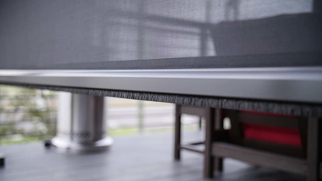 integrated retractable screens can keep warmth inside your pergola space during winter.