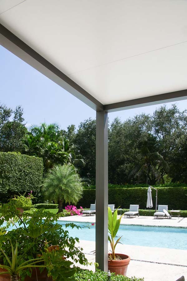 Grey bronze frame and white inulated roof R-Shade pergola by Azenco