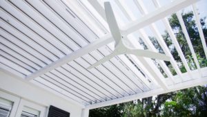for areas where simply circulating the dry heat or heavy humid air isn’t enough to keep you cool, you can opt for some added power with a ceiling fan for your pergola