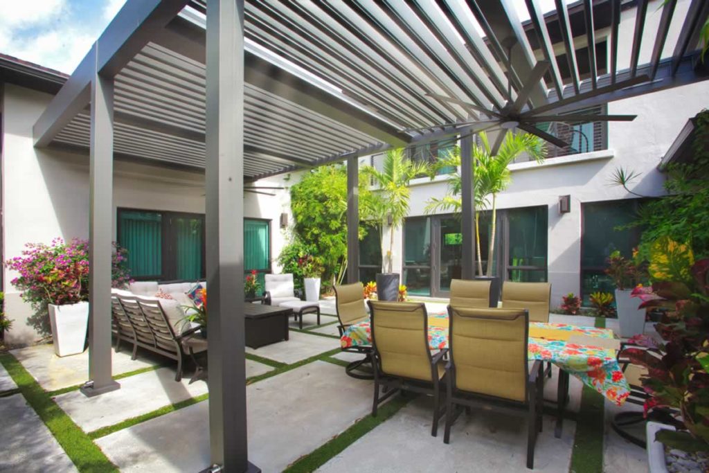 beautiful patio with louvered pergola in South Miami, Fl