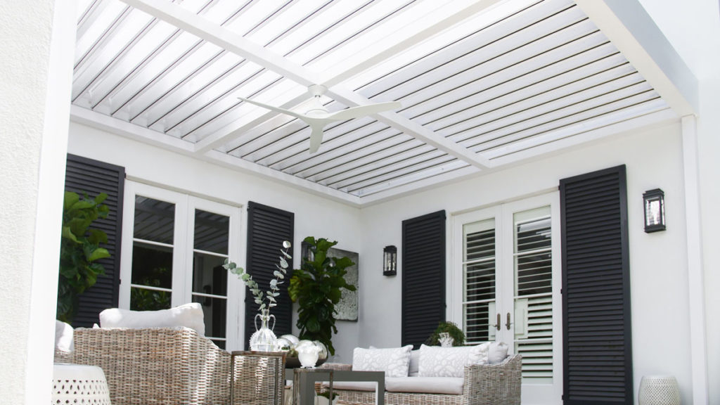 outdoor covered patio with motorized louvered pergola