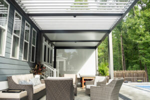long patio cover with motorized louvered roof.