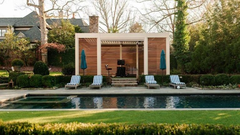 Home golf simulation clubhouse covered with r-blade motorized louevred pergola by Azenco - Charlotte, NC