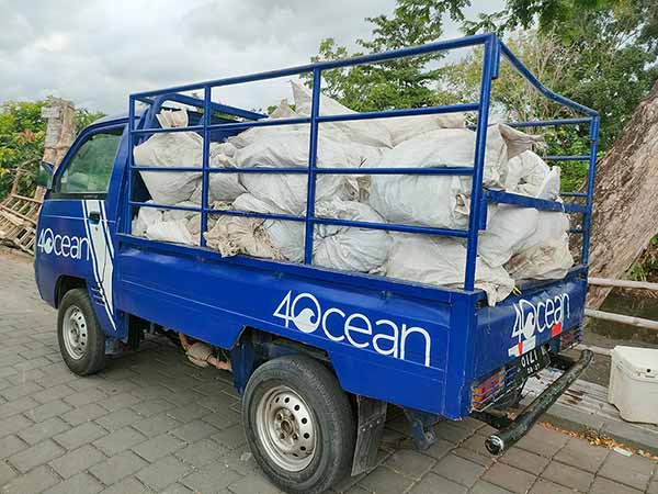World Beach Cleanup Day - Truck fully loaded with plastic trash - Azenco and 4ocean