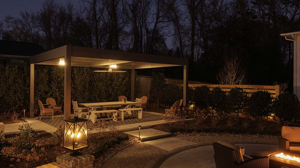 Residential outdoor project with insulated roof patio cover - Night view. R-SHADE by Azenco Outdoor