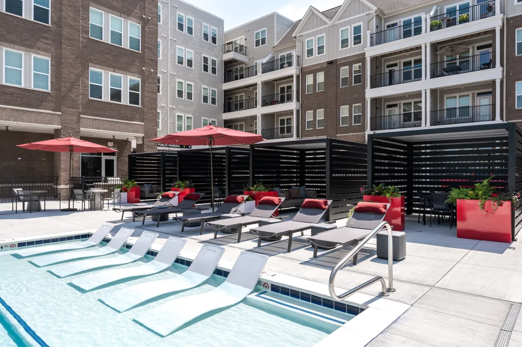 k-banas used poolside at a condominium