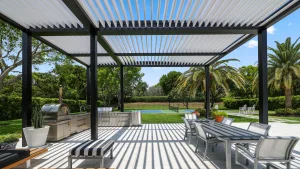 gray bronze r-blade with white louvers in a backyard