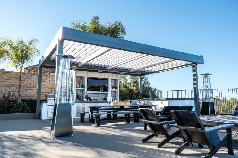 gray r-blade in an outdoor patio with dining and kitchen