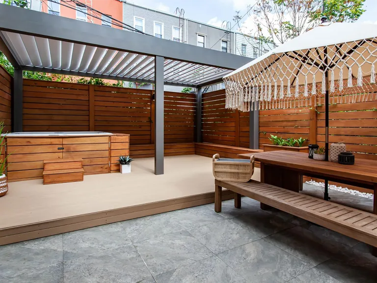 white r-blade in a private patio with a hot tub