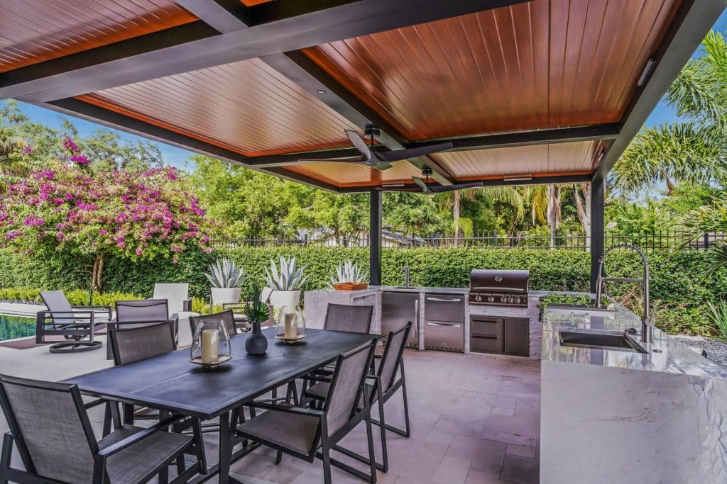 black r-shade - wood grain panels - fans- led lights - cantilever post - kitchen - pool - table 26