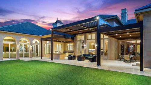 Gigantic louvered roof structure - luxury backyard covered space