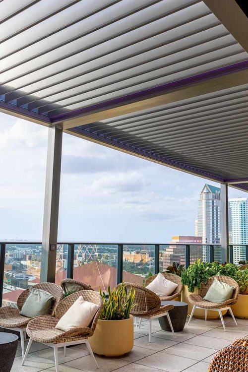 R-BLADE autoamted louvered roof for hotel rooftop - R-BLADE pergola by Azenco
