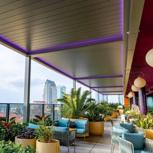 RGB light option for custom commercial pergola - R-BLADE motorized louvered roof - Azenco Outdoor