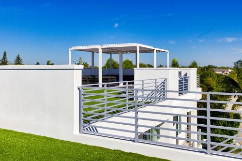 Residential aluminum cabana by Azenco on a rooftop terrace