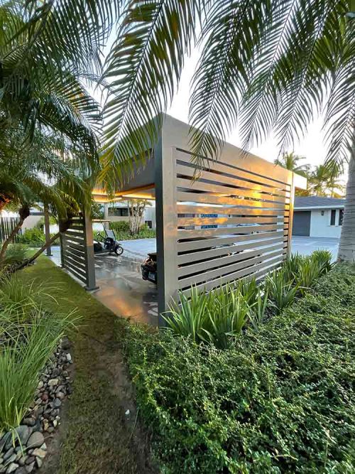 Residential carport with privacy wall