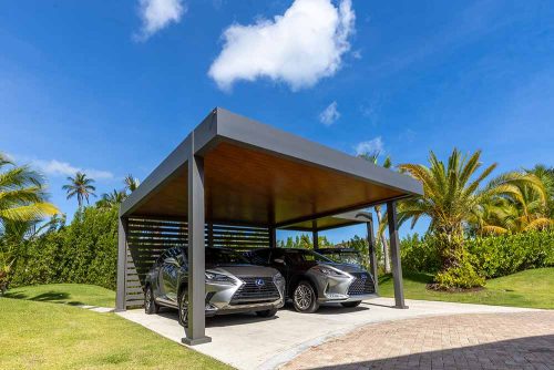 Cantilevered custom carport - Wood finish insulated roof by Azenco