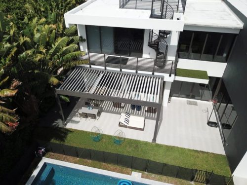 pergola strucutre with motorized louvered roof - louvers open