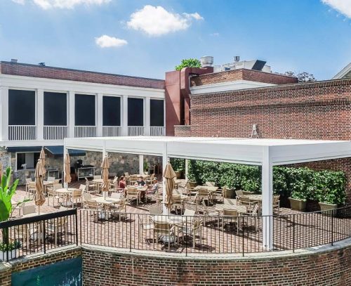 Aerial view of the Wykagyl country club terrace - Aluminum freestanding pergola R-Blade by Azenco Outdoor