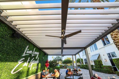 open louvered roof pergola R-BLADE for restaurant terrace, by Azenco