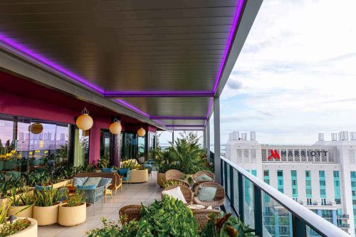 Marriot rooftop terrace with azenco louvered pergola R-BLADE - Azenco Outdoor