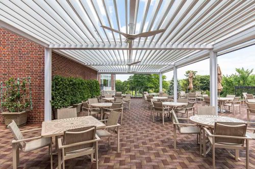 White custom motorized pergola by Azenco - Country club in New York State