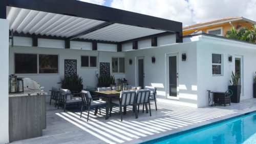 Custom aluminum louvered pergola with risers