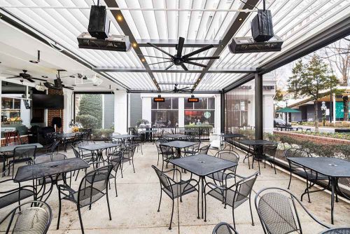 heaters, fan and open motorized louvered roof - Commercial outdoor space with R-BLADE pergola by Azenco