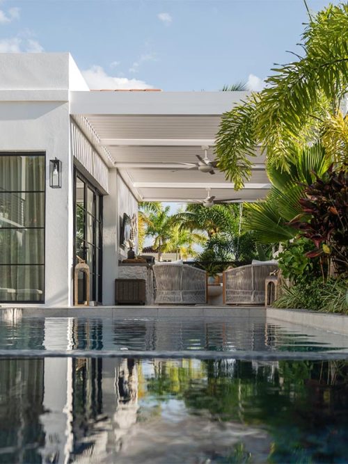 residential white custom pergola and outdoor living space - R-BLADE by Azenco Outdoor