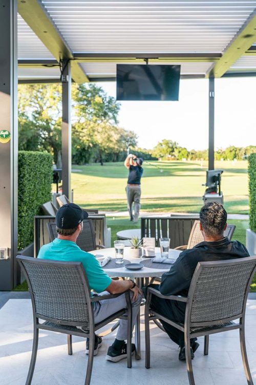 Interactive suite connected with motorized pergola system for golf country club - Azenco pergola