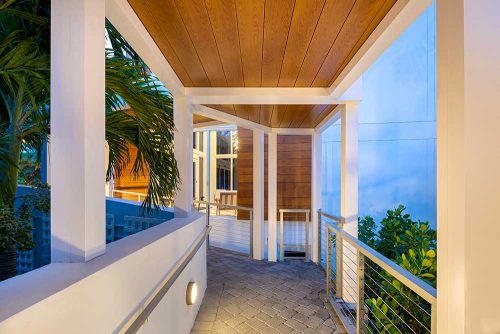 Wood grain powder coated roof with white frame pergola. Azenco pergola